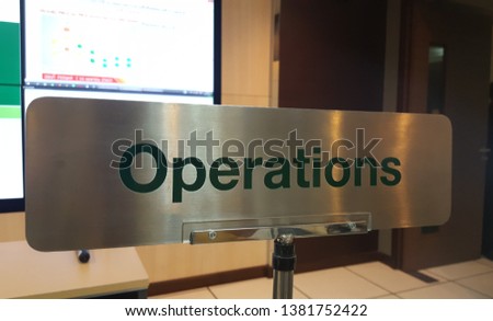 operations sign in room meeting Royalty-Free Stock Photo #1381752422
