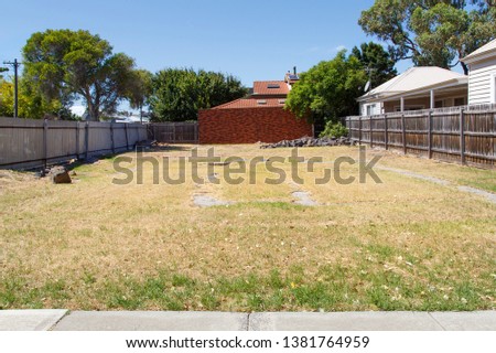 Large garden area to be sold on as a building plot. Vacant land available for building is very expensive in the Melbourne suburbs.  Royalty-Free Stock Photo #1381764959