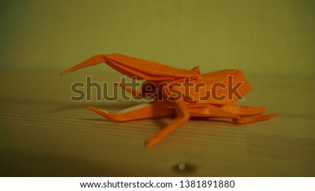 Orange Dynastes hercules made of paper
