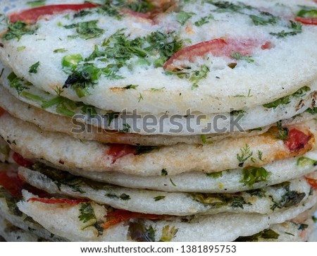 Delicious Myanmar’s street food , coriander and Tomato pizza .. health food