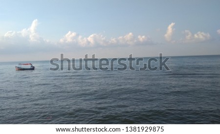 beautiful sea views  ships sailing in the sea under the beautiful clouds