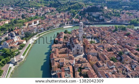 Aerial drone photo from iconic Cathedral of Verona next to Adige river, Lombardy, Italy