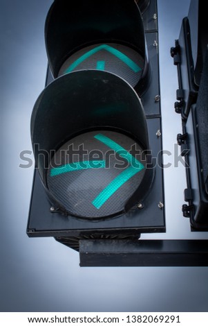 Traffic light. Green arrow sign. Turning right