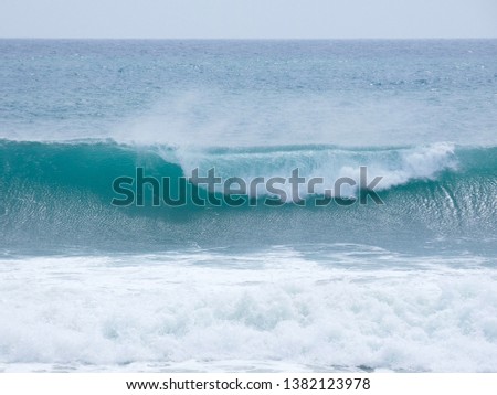 Wave breaking on a Mediterranean beach, after a storm.