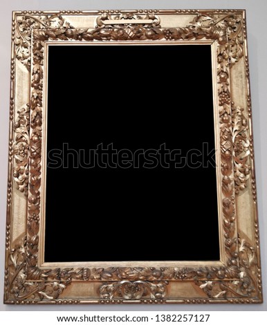 Empty gold painting molding frame isolated