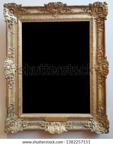 Empty gold painting molding frame isolated