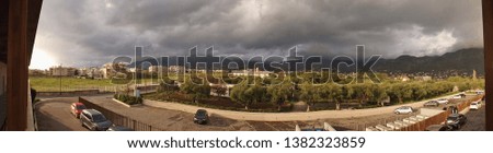 Panorama picture of part of the city of Kalamata and surrounding mountains, in spring.  Peloponnese, Greece, South-east Europe.