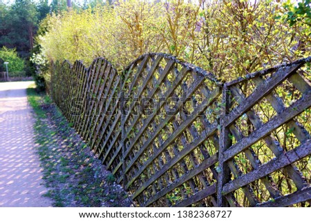 wooden fence on the road