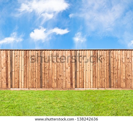Unlimited endless seamless pattern of the wooden fence at the grass
