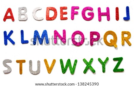 childrens style fun glittery colourful letters on white background with shadow