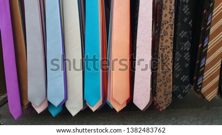 multicolor men's fashion ties lined up side by side for sale