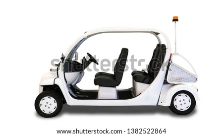 Electric golf car in the airport for convenience in transportation. Picture is isolated on white background. Clipping path is included.