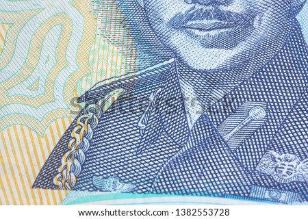 Macro image on NEGARA BRUNEI DARUSSALAM One Dollar or Satu Ringgit closeup with selective focus

