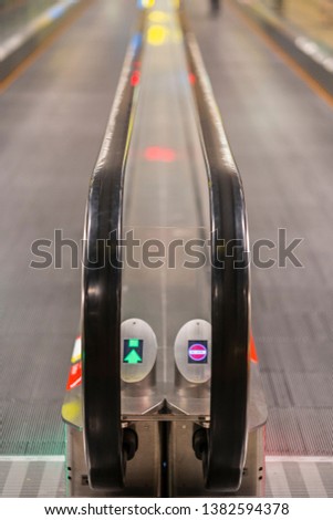 Escalator walkway signal light working and stop working. Inform Sign abstract for choose the way to go or not go.