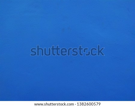 Blue cement concrete wall abstract texture background and wallpaper. 