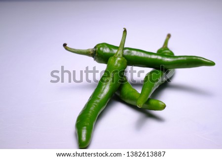 beautiful green chilli picture on white background