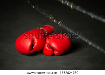 Red Boxing Sports, boxing glove on boxing ring in gym 