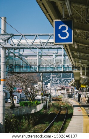 A Japanese train station on platform number 3