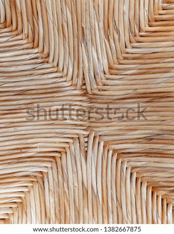 light brown cross shaped wicker close up, seamless natural background