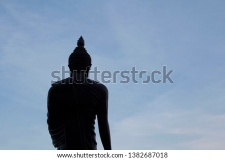 statue of Buddha is a sacred and revered Buddha image located outdoors inside the school for students to pay homage to the blue sky in the evening and see the serene atmosphere.