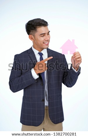 Asian handsome young business man holding concept paper icon props