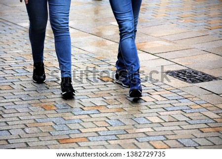 legs of business people walking on city street - please check the pictures