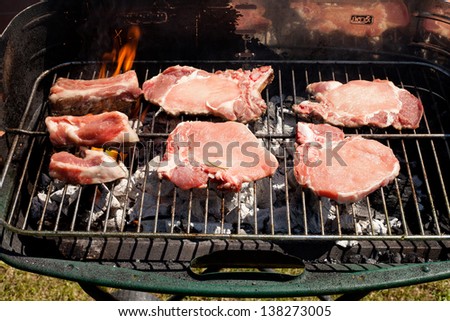Flames grilling a steak