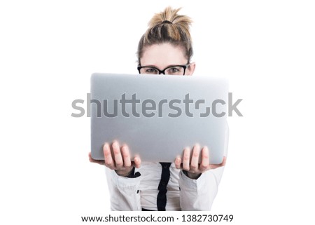 Facial expressions of young secretary with laptop