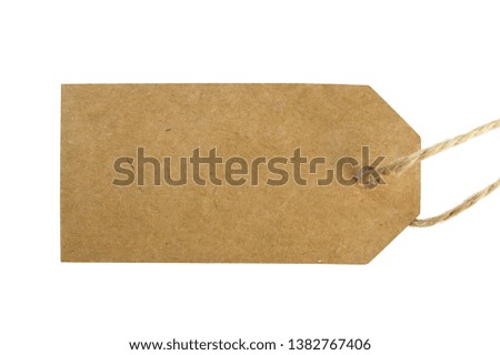 Blank brown cardboard  tied with string. Price, gift, sale, address  label tag isolated on white background.