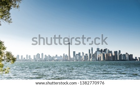 Toronto city skyline from centre Island with blue sky. Ontario, Canada