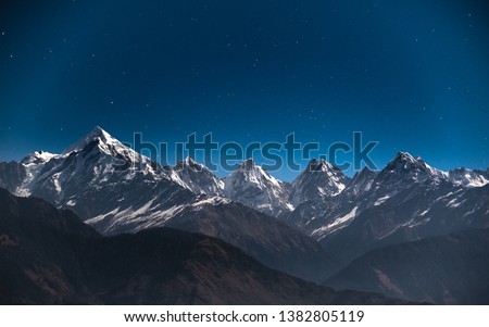 Long shutter time night view of sky at Munsiyari, Kumaon region, Uttarakhand, India. Royalty-Free Stock Photo #1382805119