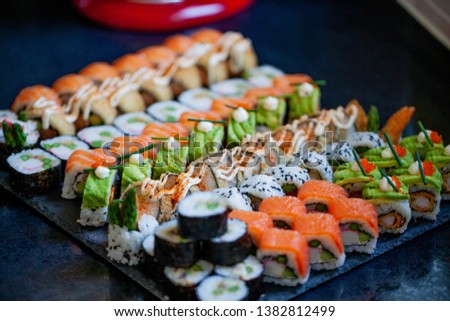 colorful and delicious mixed sushi roll plate
