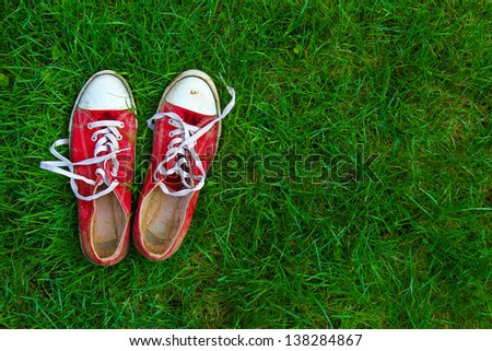 sport shoes on grass background