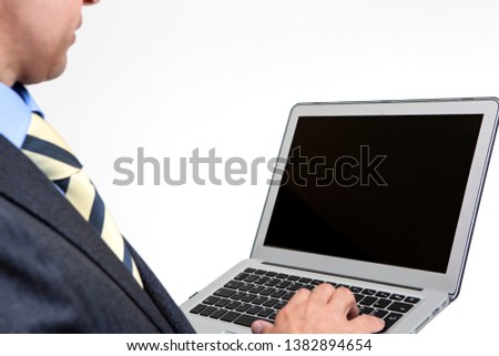 Young Businessman Working With Lapton. Against White. Horizontal Image Orientation