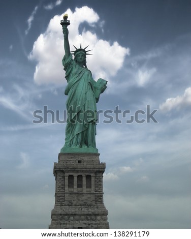New York, Jun 13: Statue of Liberty at the entrance of the harbor in front of Manhattan.