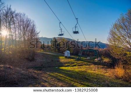 Empty Ski Resort in the end of Winter with empty cable