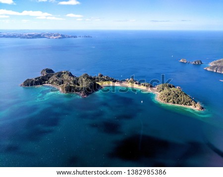 Opua Island, New Zealand from a helicopter. Tropical paradise.