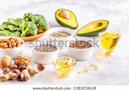 Vegan sources of omega 3 and unsaturated fats. Concept of healthy food. Royalty-Free Stock Photo #1383018638