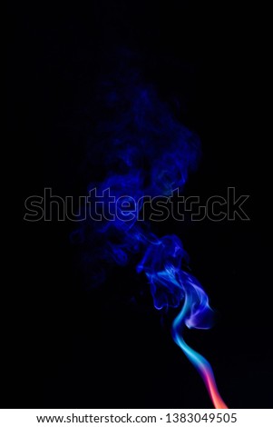 Colourful smoke on dark background 