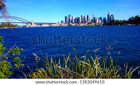 Harbour Bridge, Opera House and City Skyline of Sydney from Balls Head Reserve in North Sydney, New South Wales, Australia