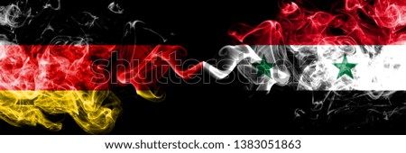 Germany vs Syria, Syrian smoky mystic flags placed side by side. Thick colored silky smoke flags of Deutschland and Syria, Syrian.