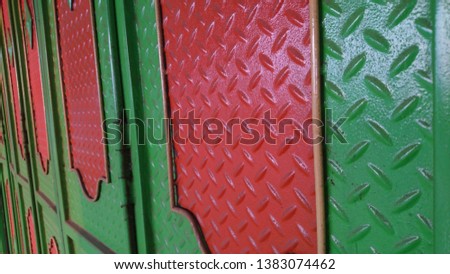 iron and green metal doors