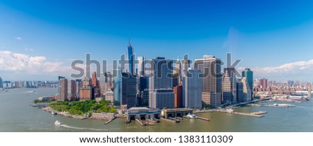 Aerial skyline of Lower Manhattan on a beautiful sunny day.