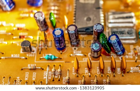 electronic components resistors and capacitors on TV circuit board