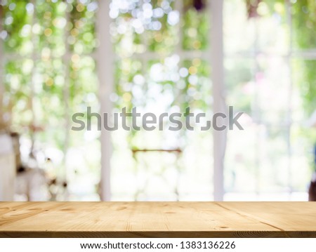 wood table top white garden bokeh background. Use for display or present product on wood shelf