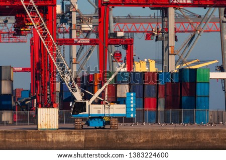 Shipping containers and cranes at the Lisbon Port in Portugal, 