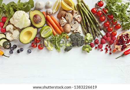 Healthy food. Selection of vegetables, fruits and berries for ketogenic diet, clean eating, plant based, vegetarian and super food concept.