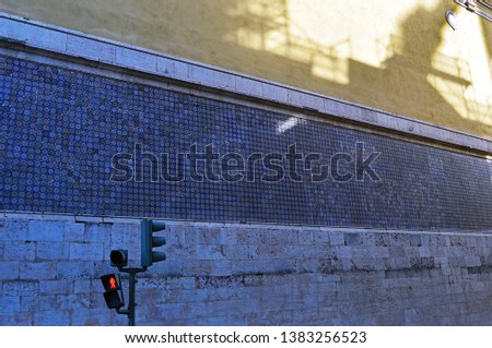 The lateral wall of the Catholic Church Igreia de Nossa Senhora da Encamacao on the rua do Alecrim in Lisbon, Portugal