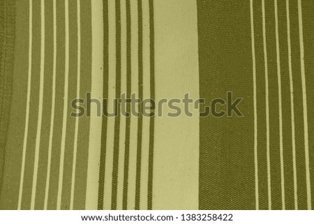 Striped pattern with stylish colors. Yellow and white stripes.