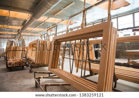 Joinery. Manufacture of wooden doors, windows, furniture Royalty-Free Stock Photo #1383259121